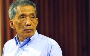 Kaing Guek Eav, also known as Duch, looks on during his sentencing at the U.N.-backed war crimes tribunal in Phnom Penh, Cambodia, Monday, July 26, 2010. (AP Photo/ Extraordinary Chambers in the Courts of Cambodia).