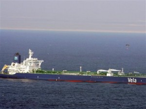 A parachute dropped by a small aircraft is observed, in this U.S. Navy photo, as it drops over the MV Sirius Star Friday, Jan. 9, 2009, during an apparent payment via a parachuted container to pirates holding the ship.  Somali pirates released the oil-laden Saudi supertanker after receiving a $3 million ransom, a negotiator for the bandits said Friday. The ship owner did not confirm it. The MV Sirius Star, a brand new tanker with a 25-member crew, was seized in the Indian Ocean Nov. 15 in a dramatic escalation of high seas crime.(AP Photo/U.S. Navy,  Air Crewman 2nd Class David B. Hudson)